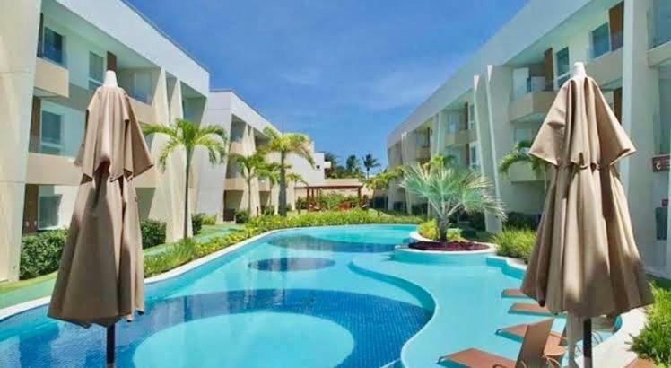 Guarajuba - Porto Smeralda 2 Suites Camacari Bagian luar foto